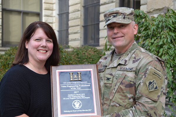 Colonel Secrist presents Melissa Boyd with her award of the USACE Value Engineer of the Year for 2017.