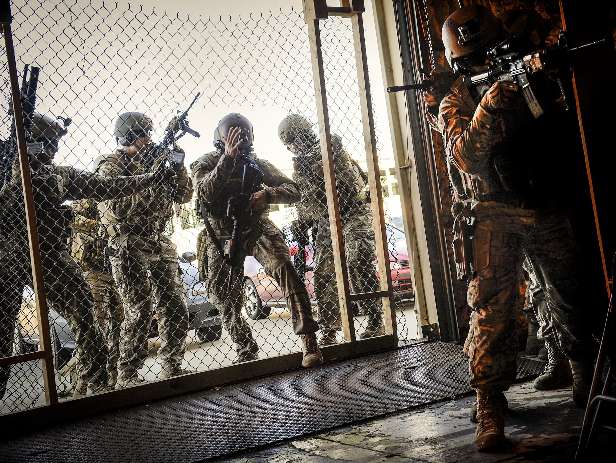 The 791st Missile Security Forces Squadron tactical response force members enter a facility at Minot Air Force Base, N.D., Oct. 14, 2015.