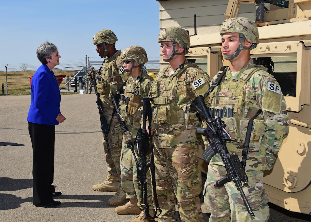 The 791st Missile Security Forces Squadron tactical response force members enter a facility at Minot Air Force Base, N.D., Oct. 14, 2015. Twentieth Air Force implemented a missile field security forces restructure that aims to increase the readiness and lethality of defenders across the Numbered Air Force.