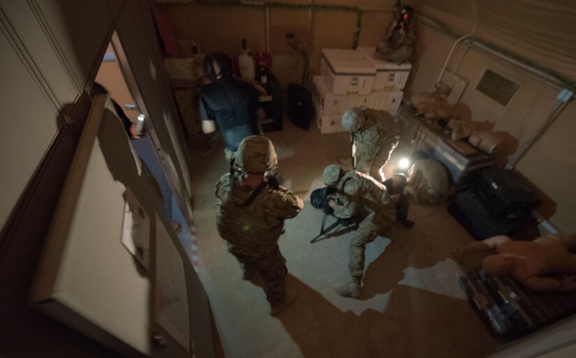 Soldiers go through a room-clearing exercise.