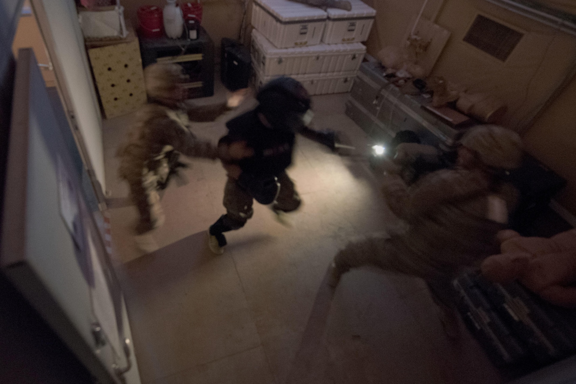 Soldiers go through a room-clearing exercise.