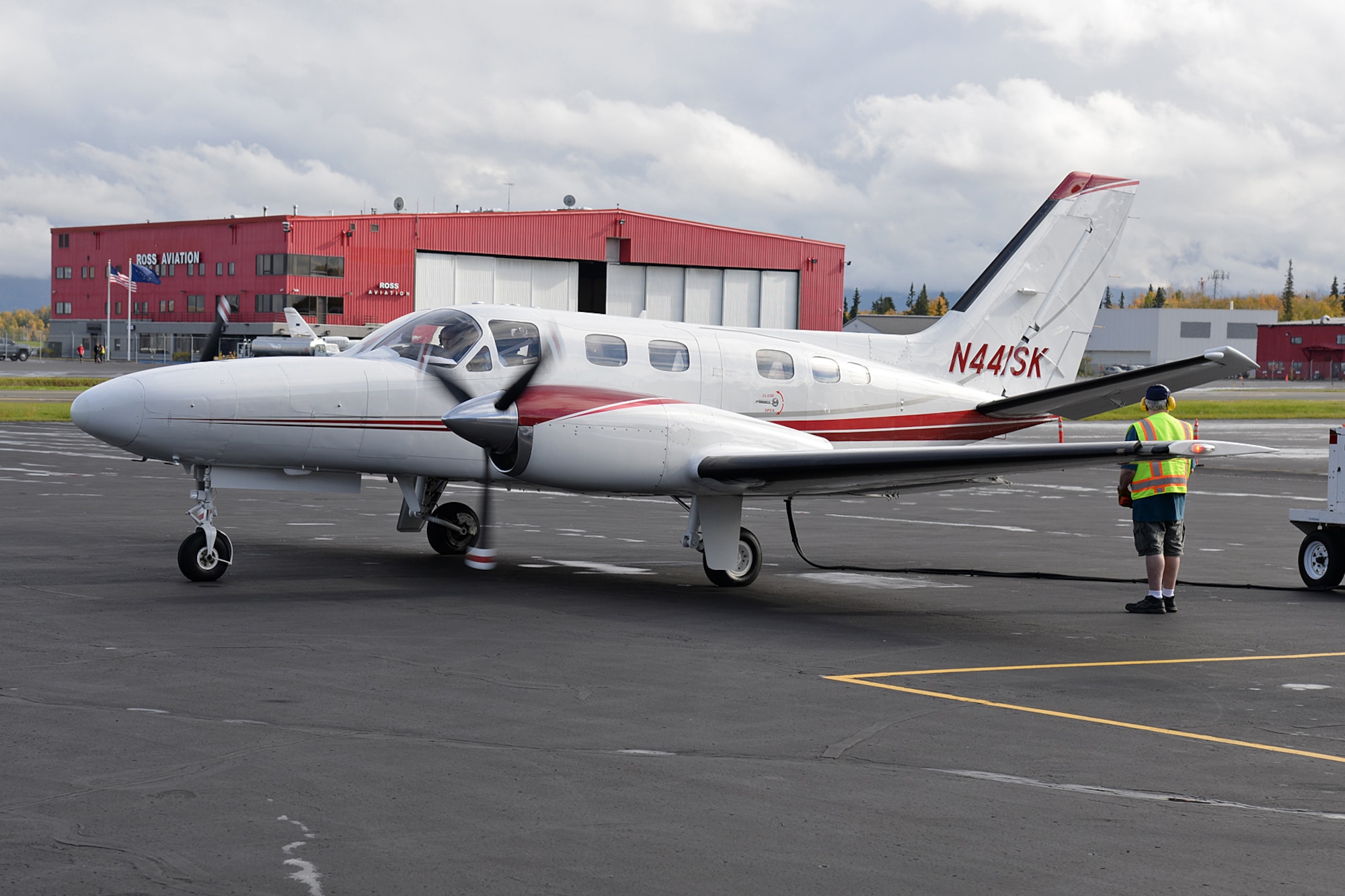 526th Electronics Maintenance Squadron depot field team members Jim Egbert, Justin Cevering and Wayne Howard depart Anchorage, Alaska, on Sep. 25, 2017, in a chartered Cessna Conquest II aircraft. (U.S. Air Force photo by Alex R. Lloyd)