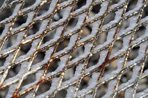 Rime ice forms as cold, moist air is blown across the radome perimeter catwalk at Cape Romanzof on Sep. 26, 2017. This is one example of weather related conditions that make maintenance so difficult in Alaska. (U.S. Air Force photo by Alex R. Lloyd)