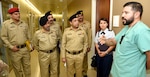 Aldo Arredondo (left) explains burn care procedures to (from left) Maj. (Dr.) Nafees Abu Ul Ala, Brig. Gen. (Dr.) Ahmed Tahir Masood, Col. (Dr.) Ali Muhammad; Brig. Gen. (Dr.) Saadat Ali Janjua, and Col. (Dr.) Akhtar Khalid Ibrahim Sept. 13 during a two-day Subject Matter Expert Exchange, or SMEE,  engagement between the Pakistani Army and the U.S. Army Institute of Surgical Research at Joint Base San Antonio-Fort Sam Houston, as Maj. Elena Amspacher, SMEE program coordinator looks on.