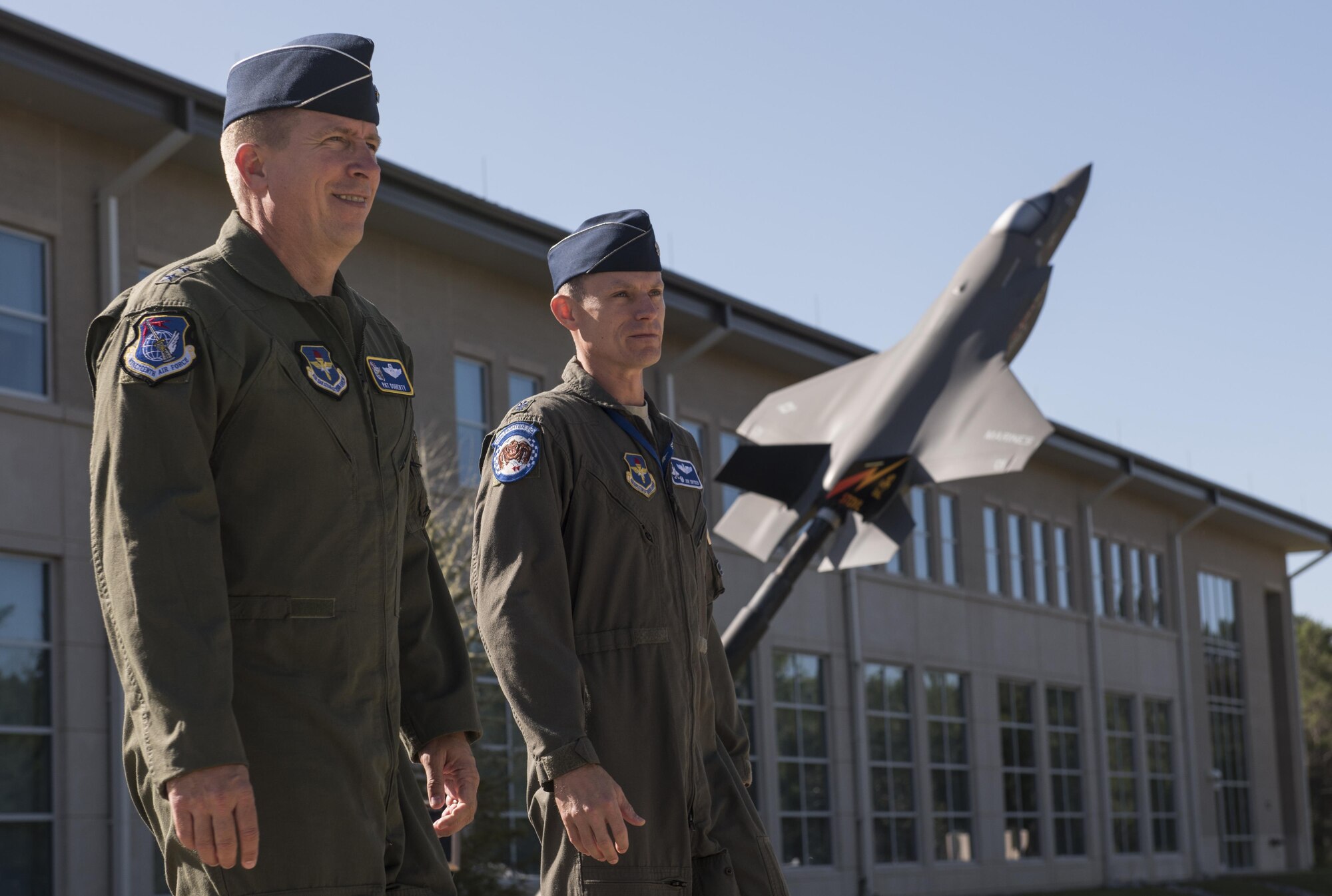 U.S. Air Force Maj. Gen. Patrick Doherty, 19th Air Force commander, left, exits the F-35 Academic Training Center with Lt. Col. John Snyder, 58th Fighter Squadron commander, Oct. 3, 2017, at Eglin Air Force Base, Fla. Doherty and other 19th AF leadership visited the 33rd Fighter Wing to meet with the Airmen who carry out the mission on a daily basis. This interaction bridges the gap between the tactical and strategic levels of operations, ensuring everyone is oriented to a common goal. (U.S. Air Force photo by Staff Sgt. Peter Thompson)
