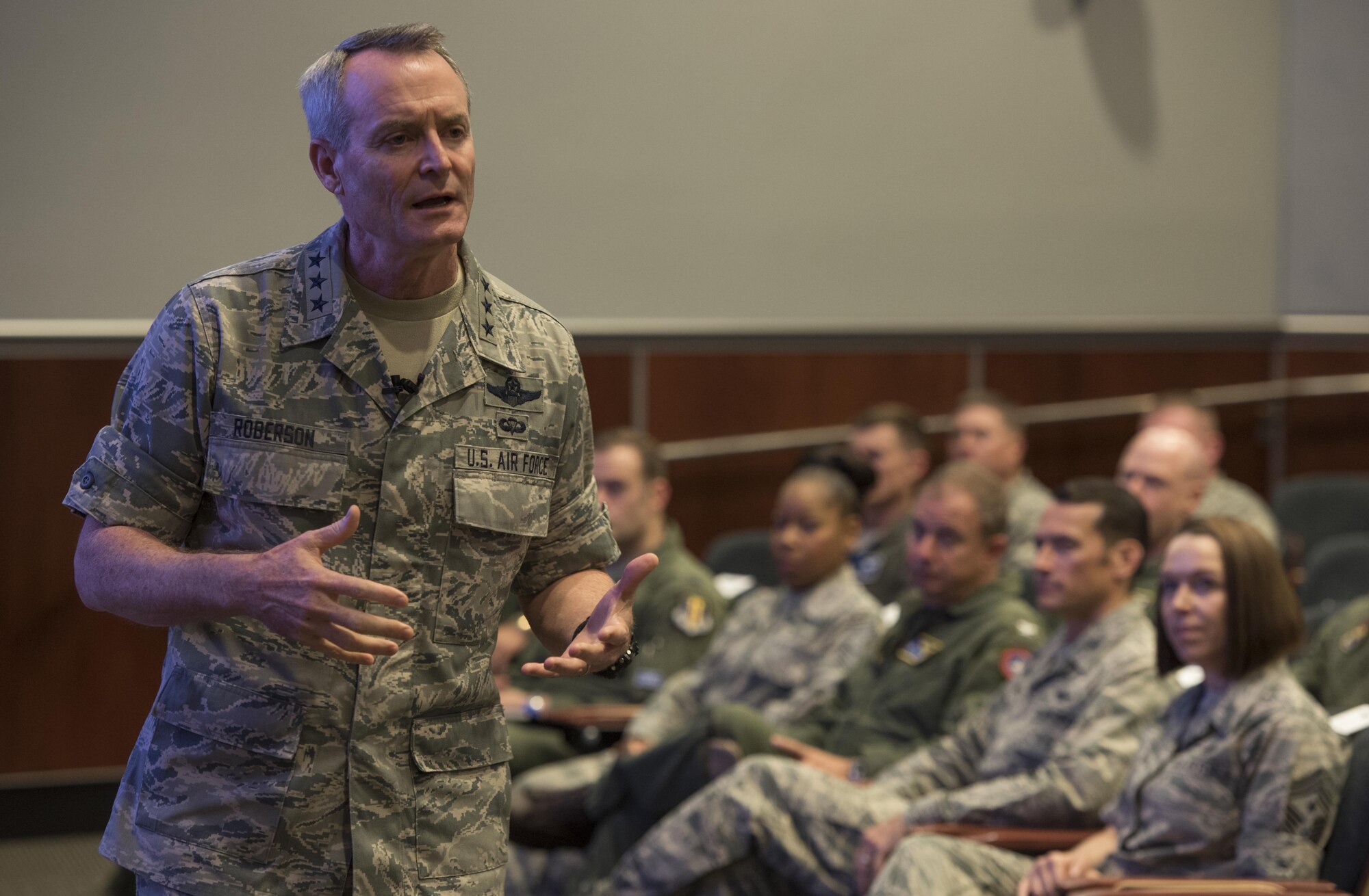 U.S. Air Force Lt. Gen. Darryl Roberson, Air Education and Training Command commander, speaks with members of the 33rd Fighter Wing during a senior leadership all-call Oct. 3, 2017, at Eglin Air Force Base, Fla. Roberson and Chief Master Sgt. Juliet Gudgel, AETC command chief, visited the wing to discuss recent successes, challenges and ways to overcome those challenges in the future. (U.S. Air Force photo by Staff Sgt. Peter Thompson)
