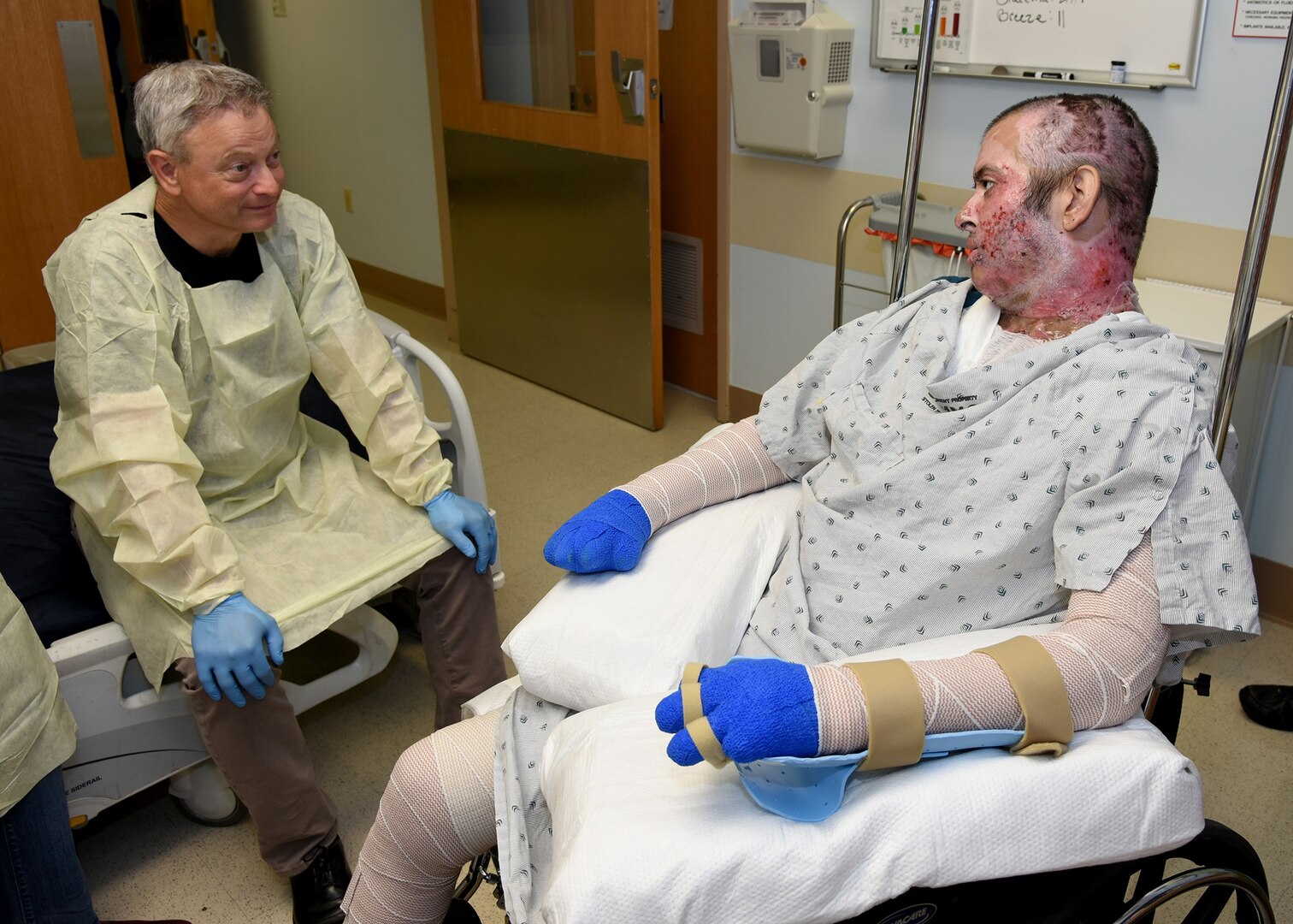 Actor Gary Sinese stopped by the U.S. Army Institute of Surgical Research Burn Center at Joint Base San Antonio-Fort Sam Houston to visit Staff Sgt. Christopher Guerrero Sept. 15.