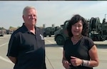 Michael Lambrecht (left) talks to Nutan Chada at Fairchild Air Force Base airfield