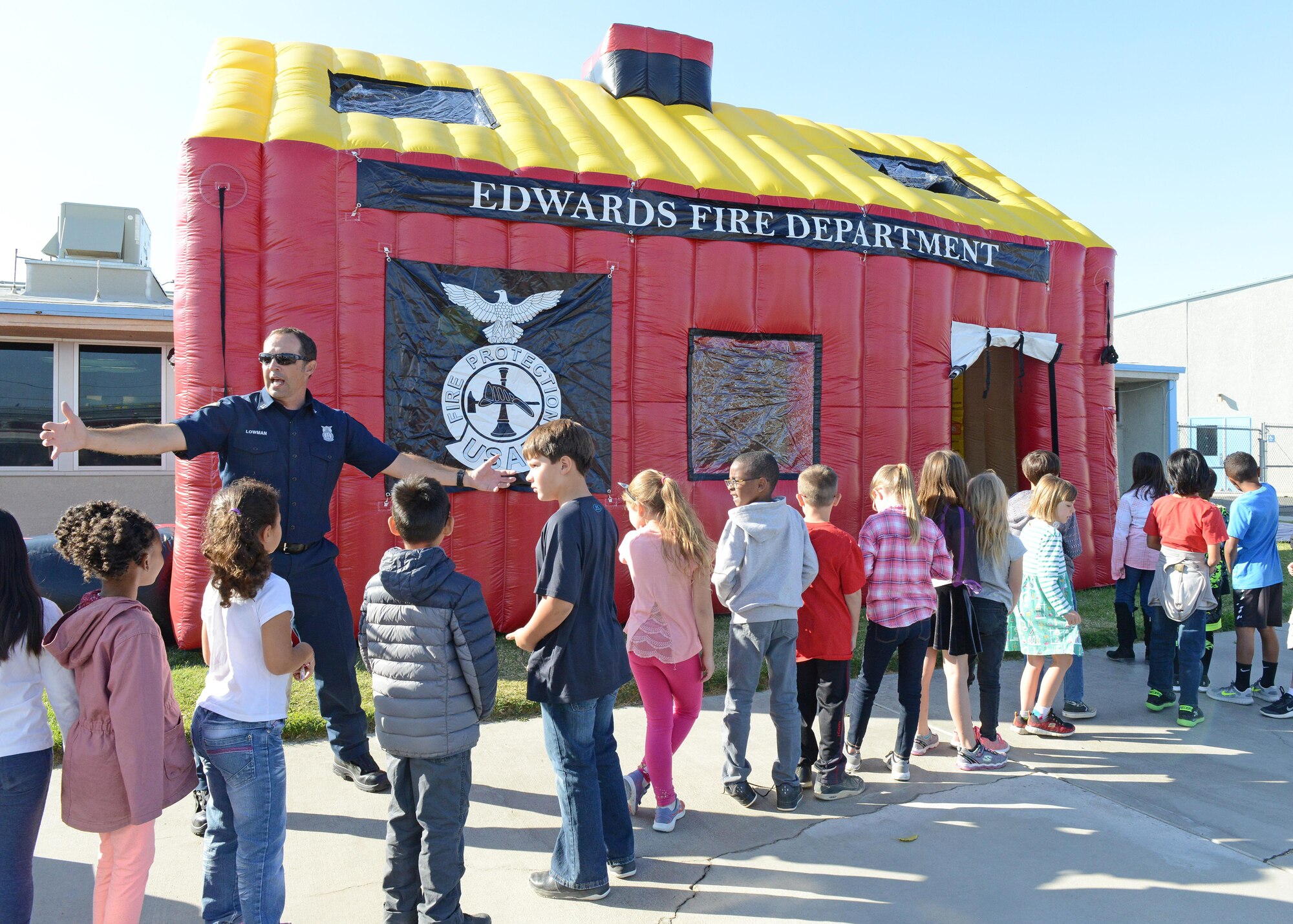 Edwards Air Force Base Fire Department personnel visit students at Branch Elementary at Edwards AFB.