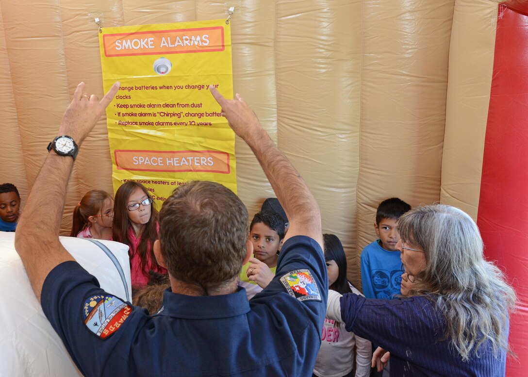 Edwards Air Force Base Fire Department personnel visit students at Branch Elementary at Edwards AFB.