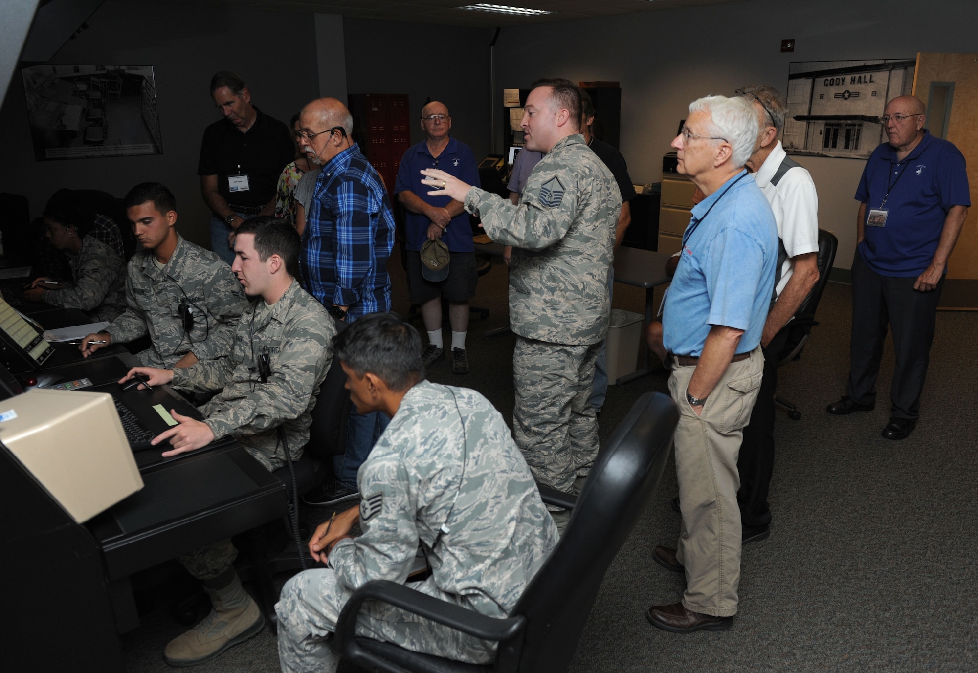 Master Sgt. Gary Cozzetti, 334th Training Squadron instructor, provides a tour inside the air traffic control radar simulator at Cody Hall during the U.S. Air Force Flight Checkers Association tour Oct. 10, 2017, on Keesler Air Force Base, Mississippi. The association’s mission is “to honor and perpetuate the memory of all who served in the USAF Facility Checking Units in peace and war.” During their visit to Keesler they also viewed an aircraft static display and received a windshield tour of the base. (U.S. Air Force photo by Kemberly Groue)