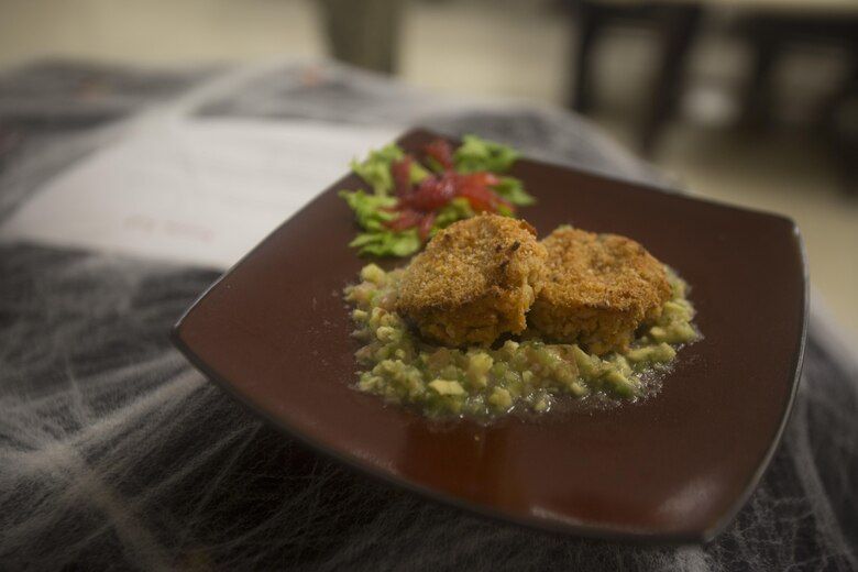 “Crispy Mr. Krab Patties,” prepared by Lance Cpl. Cynthia JaretziCruz, a food service specialist with Headquarters Battalion, Marine Corps Base Hawaii (MCBH), and the winner of the “Chef of the Year” competition, is displayed at Anderson Hall, MCBH, Oct. 4, 2017. The competition pitted each winner or runner-up of the “Chef of the Quarter” cook-off against each other in a series of evaluations including a written test, display/presentation, and creativity. (U.S. Marine Corps photo by Lance Cpl. Luke Kuennen)