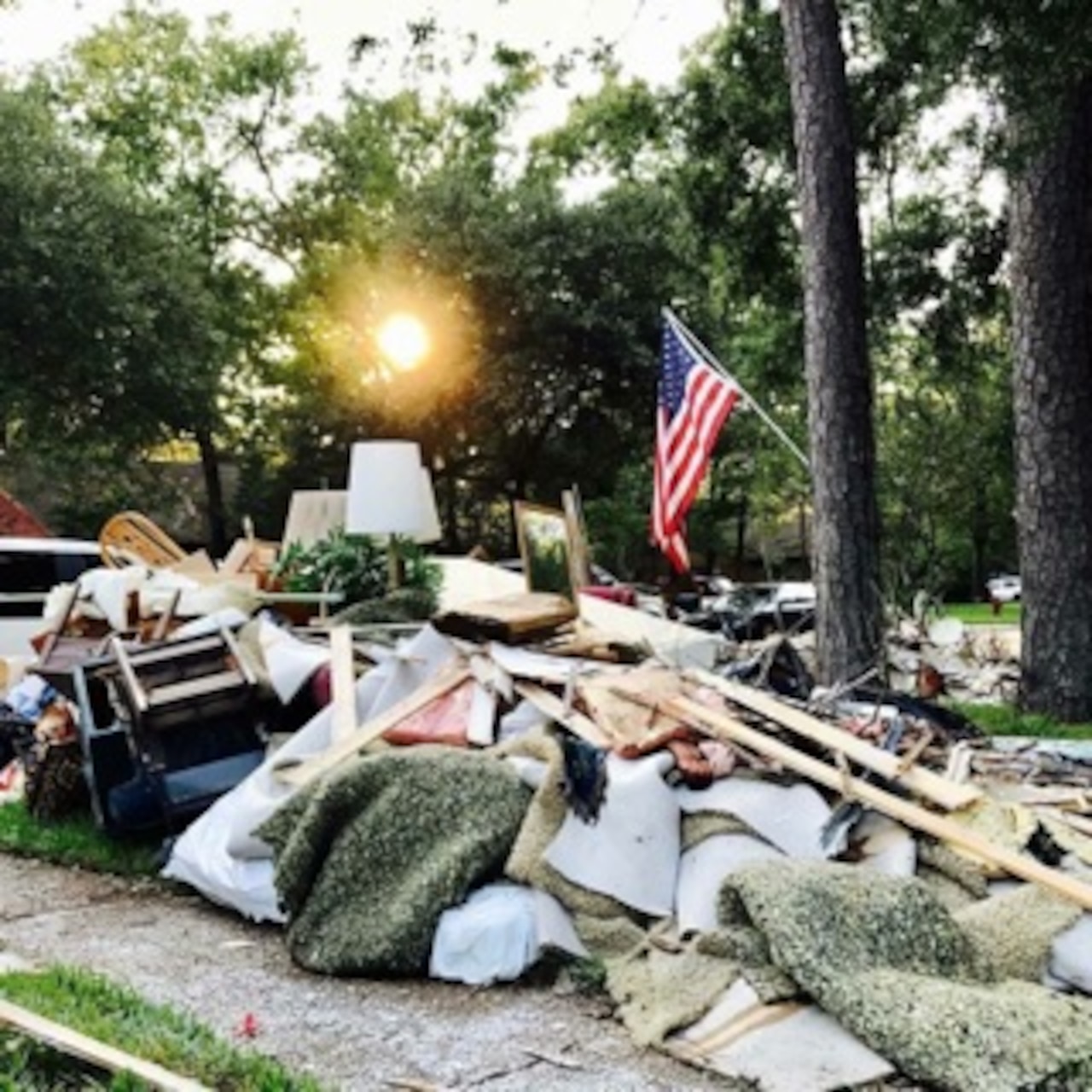 Piles of debris sit outside a residential home in Friendswood, Texas.(Courtesy Photo)