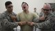 Col. Sergio Vega, 374th Airlift Wing vice commander, reacts to being tased during a 374th Security Forces Squadron less-lethal weapons demonstration, Oct. 11, 2017, at Yokota Air Base, Japan.