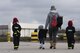Members of the Kaiserslautern Military Community walk toward the fire protection aircraft trainer during the Fire Prevention Week open house at Ramstein Air Base, Germany, Oct. 7, 2017. The simulator is used by fire fighters to practice putting out fires on a simulated aircraft. Fire Departments from Ramstein Village, Landstuhl, Carlsberg, and Technical Relief Foundation (THW) Kaiserslautern, participated in the parade and open house. (U.S. Air Force photo by Airman 1st Class Devin M. Rumbaugh)