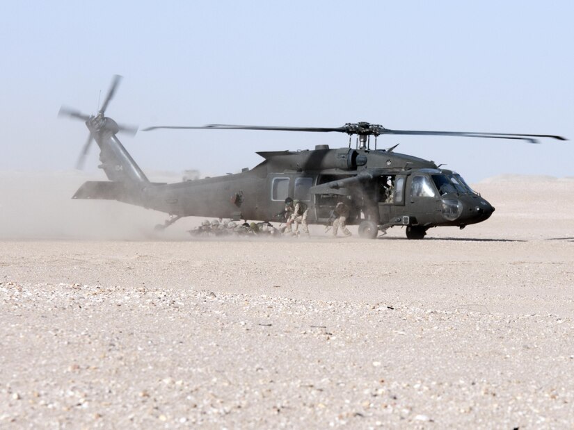 Black Hawk helicopter in the desert.