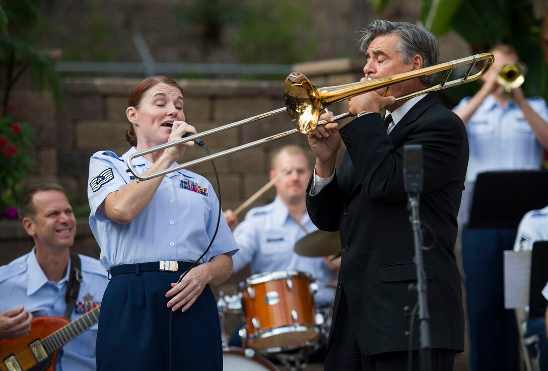 Singer and trombonist perform together