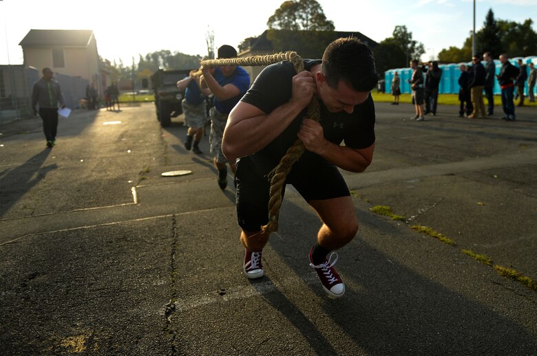 U.S. Air Force Senior Airman Devin Swain, 24th Intelligence Squadron intelligence analyst, participates in a humvee pull event during the 693rd Intelligence, Surveillance, and Reconnaissance Group’s Highland Games at Wiesbaden, Germany, Oct. 11, 2017. The 693rd ISRG’s units are scattered in several locations in Germany and converge every year in Wiesbaden for the competition. (U.S. Air Force photo by Airman 1st Class Joshua Magbanua)