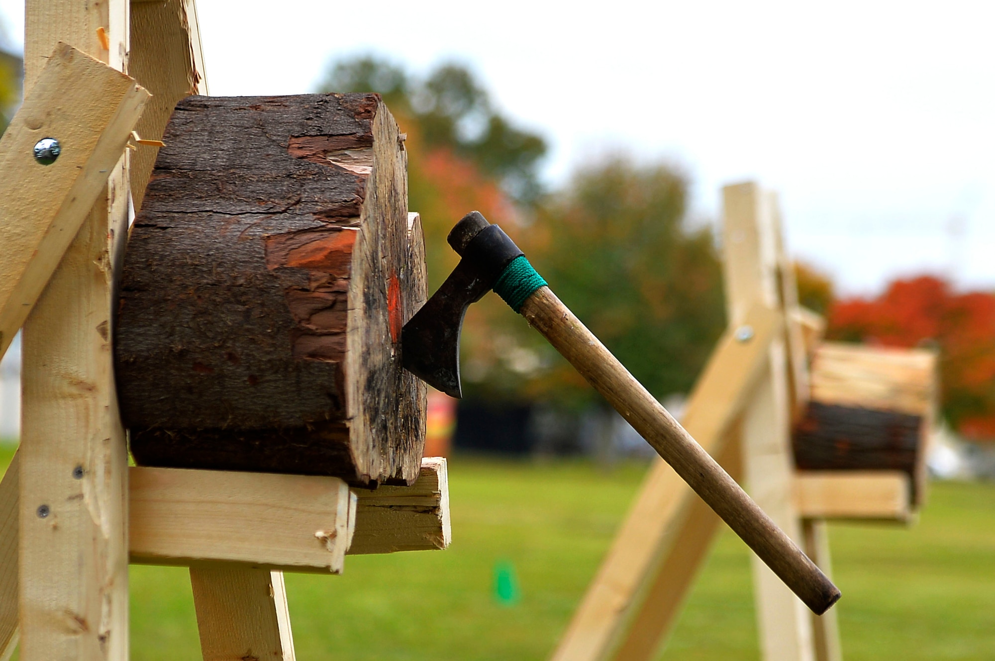 An axe sticks to a block of wood during the axe throwing event of the 693rd Intelligence, Surveillance, and Reconnaissance Group’s Highland Games at Wiesbaden, Germany, Oct. 11, 2017. The group’s Airmen are scattered in several U.S. military installations in Germany, and converge every year for the games. (U.S. Air Force photo by Airman 1st Class Joshua Magbanua)