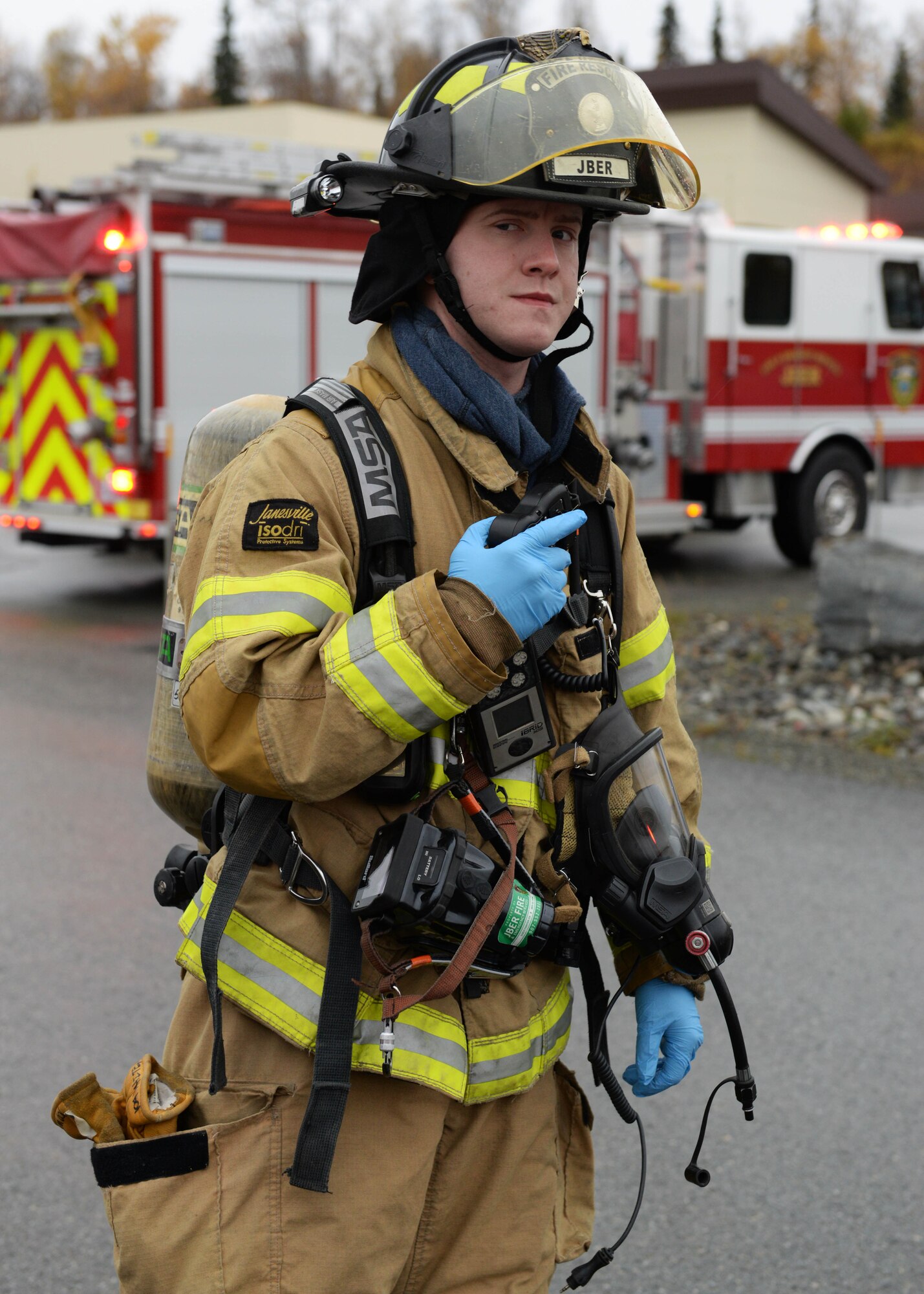 Senior Airman William White, fire protection specialist with the 673d Civil Engineer Squadron participates in a fuel spill exercise Oct. 5, 2017, at Joint Base Elmendorf-Richardson, Alaska. White participated in a fuel spill exercise simulation, which tested the response actions of base recovery agencies in the event of a mass fuel spill, to ensure installation safety and minimal environmental impact.