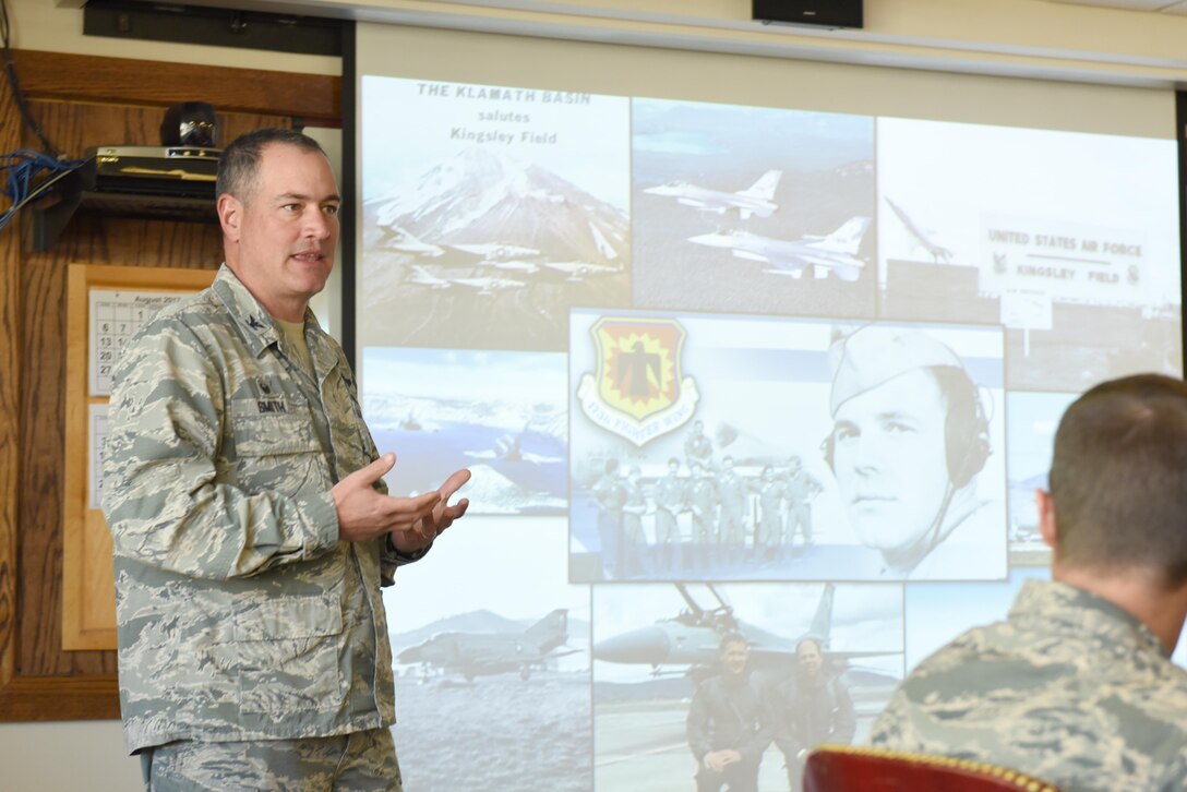 Col. Jeff Smith presents a mission brief