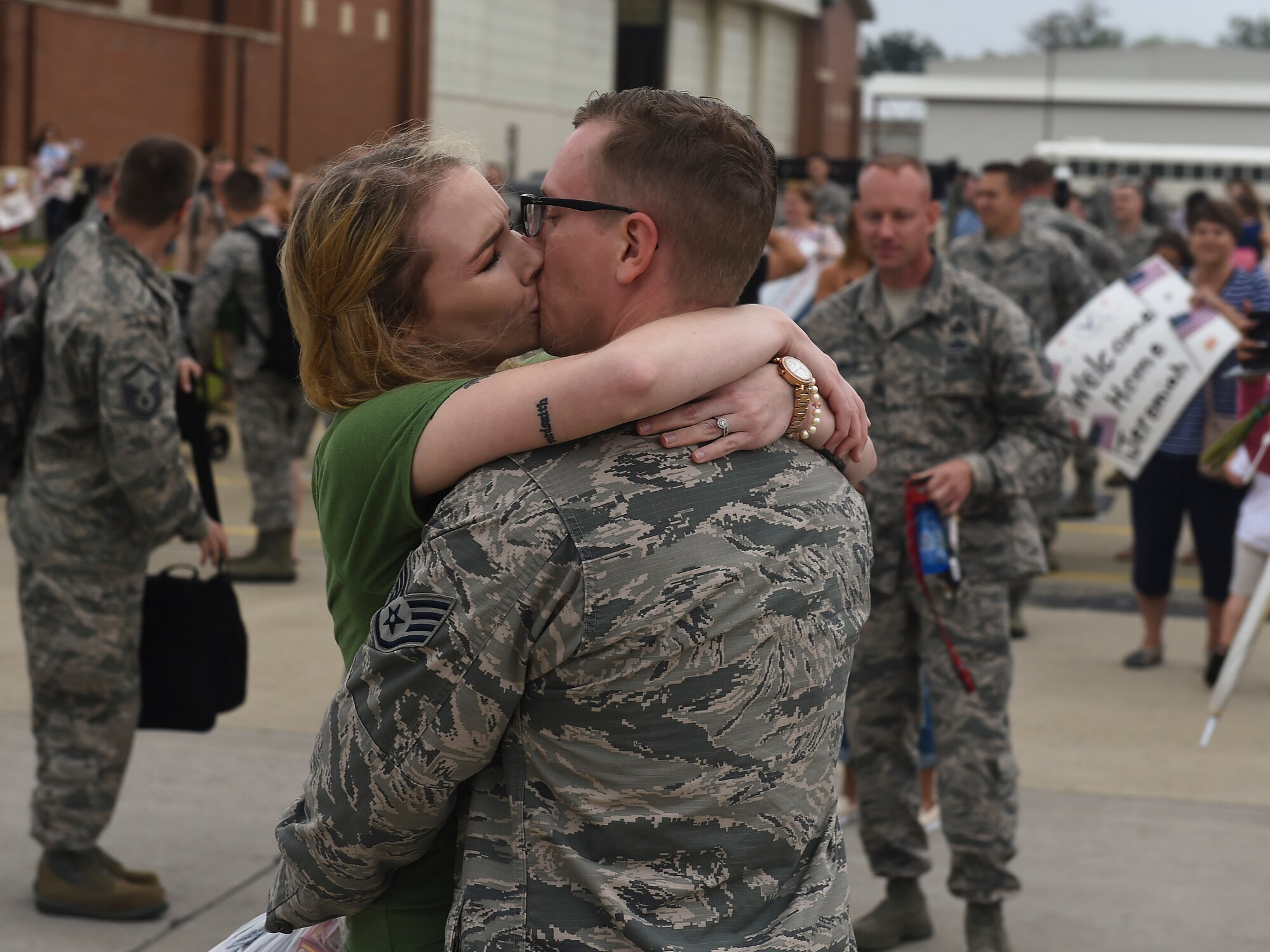 U.S. Air Force Staff Sgt. Nathaniel Sorensen, 633rd Communications Squadron client systems supervisor, kisses his wife Sarah Sorensen, at Joint Base Langley-Eustis, Va., Oct. 12, 2017.