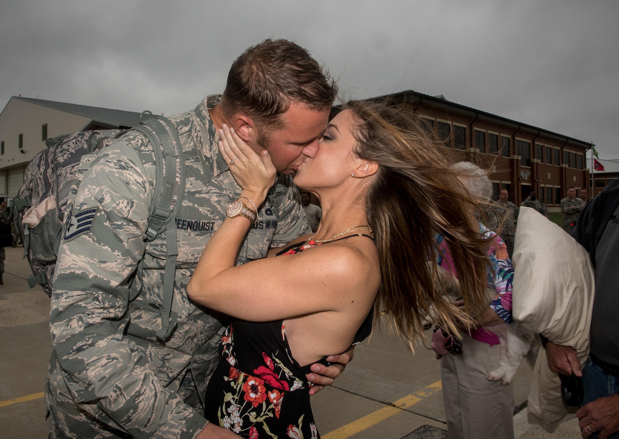 Virginia Air National Guard Staff Sgt. Jeff Greenquist, 
192nd Maintenance Squadron low observable technician, kisses his fiancé  Ashley Branham, after she accepted his proposal to marry her at Joint Base Langley-Eustis, Va., Oct. 12, 2017. Greenquist just returned from a six-month deployment to the Middle East with the 1st Fighter Wing. (U.S. Air Force photo by Staff Sgt. Carlin Leslie)