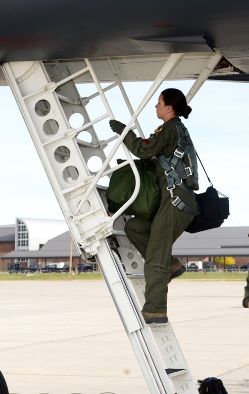 1st Lt. Kimberly, a weapon systems officer assigned to the 34th Bomb Squadron, boards a B-1 bomber for exercise Combat Raider 18-1 at Ellsworth Air Force Base, S.D., Oct. 11, 2017. Combat Raider provides joint and coalition training using realistic scenarios that support full-spectrum operations against modern threats and replicate today’s combat operations. (U.S. Air Force photo by Airman 1st Class Donald C. Knechtel)