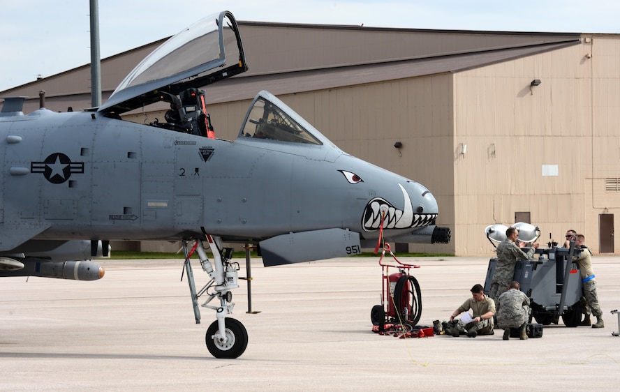 Maintainers prepare an Air Force Reserve A-10 Thunderbolt II fighter from Kansas City, Mo., for exercise Combat Raider 18-1 at Ellsworth Air Force Base, S.D., Oct. 11, 2017. Combat Raider integrates the A-10 Thunderbolt II with the B-1 bomber and helps aviators integrate as one joint unit, allowing more complex training that simulates a more realistic combat deployment. (U.S. Air Force photo by Airman 1st Class Donald C. Knechtel)