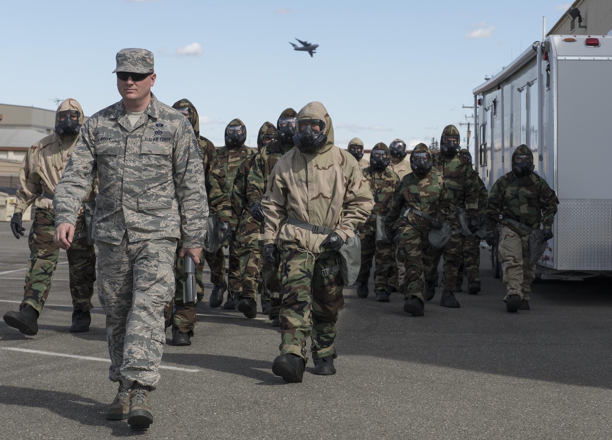 U. S. Air Force Airmen participate in a chemical, biological, radiological and nuclear defense survival skills training course on Travis Air Force Base, Calif., Sep. 21, 2017. The CBRN defense course consists of individual knowledge-based and demonstration performance objectives that provide an in-depth education on CBRN defense hazards and protective actions. (U.S. Air Force photo by Heide Couch)