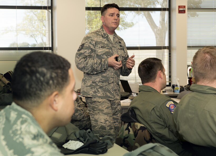 U. S. Air Force Airmen participate in a chemical, biological, radiological and nuclear defense survival skills training course taught by Tech Sgt. Donovan Root, 60th Civil Engineer Squadron on Travis Air Force Base, Calif., Sep. 21, 2017. The CBRN defense course consists of individual knowledge-based and demonstration performance objectives that provide an in-depth education on CBRN defense hazards and protective actions. (U.S. Air Force photo by Heide Couch)