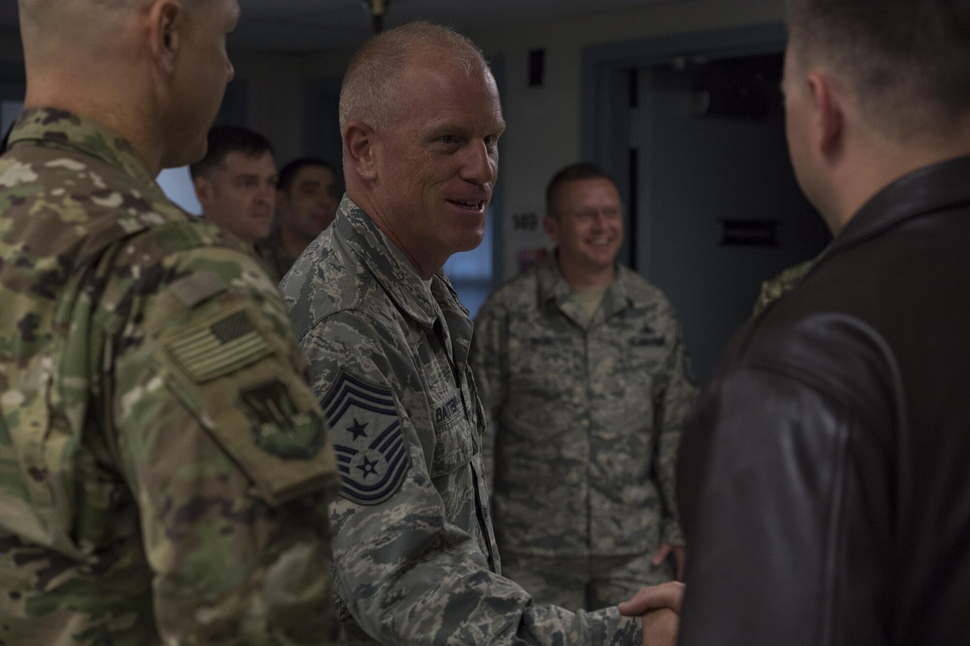 Chief Master Sergeant Frank H. Batten III, command chief of Air Combat Command, greets Airmen during his visit to the 20th Air Support Operations Squadron, Oct. 9, 2017, at Fort Drum, N.Y. Batten visited Airmen belonging to the 14th, 20th and 682d ASOS, and 18th Weather Squadron Detachment 1 during Warfighters Exercise 18-1, to observe Airmen fully engaged in roles they would fill for the Army while downrange. (U.S. Air Force photo by Senior Airman Janiqua P. Robinson)