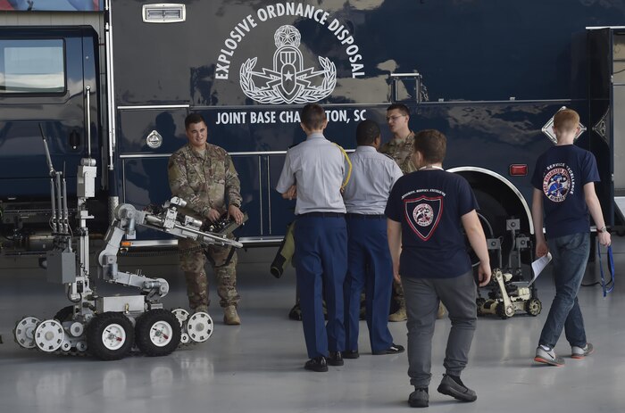 Col. Jimmy Canlas, 437th Airlift Wing commander, speaks to Junior Reserve Officer Training Corps members during Joint Base Charleston’s annual Career Day here Oct. 11, 2017, in South Carolina. Junior ROTC units attended Joint Base Charleston's annual Career Day to get a closer look at what it's like to serve in the U.S. Military, Oct. 11. Career Day is a way for the base to connect with young, and possible future service members. Approximately 250 Junior ROTC cadets had the opportunity to have a face-to-face interaction with service members representing the U.S. Army, U.S. Marine Corps, U.S. Navy, U.S. Air Force and U.S. Coast Guard.