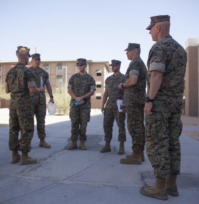 1st Lt Ryan Petty, officer in charge of the Remain Behind Unit, 7th Marine Regiment, explains the renovations made at barracks 1404 aboard the Combat Center, Oct.  5, 2017. Marines with 7th Marines and Public Works Division personnel renovated rooms and lounges for the purpose of providing improved living quarters for the deployed Marines of the regiment.  (U.S. Marine Corps photo by Cpl. Natalia Cuevas)