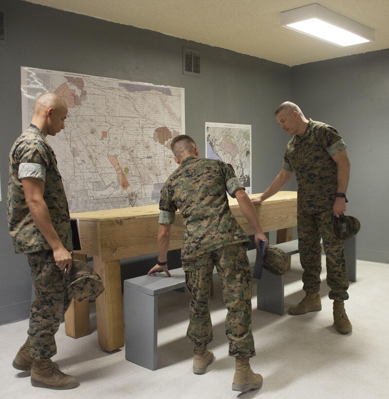 Maj. Gen. William F. Mullen III, commanding general, Marine Corps Air Ground Combat Center, Twenynine Palms, Calif., inspects one of the lounges renovated at barracks 1404 aboard the Combat Center, Oct. 5, 2017. Marines with 7th Marine Regiment and Public Works Division personnel renovated rooms and lounges for the purpose of providing improved living quarters for the deployed Marines of the regiment. (U.S. Marine Corps photo by Cpl. Natalia Cuevas)
