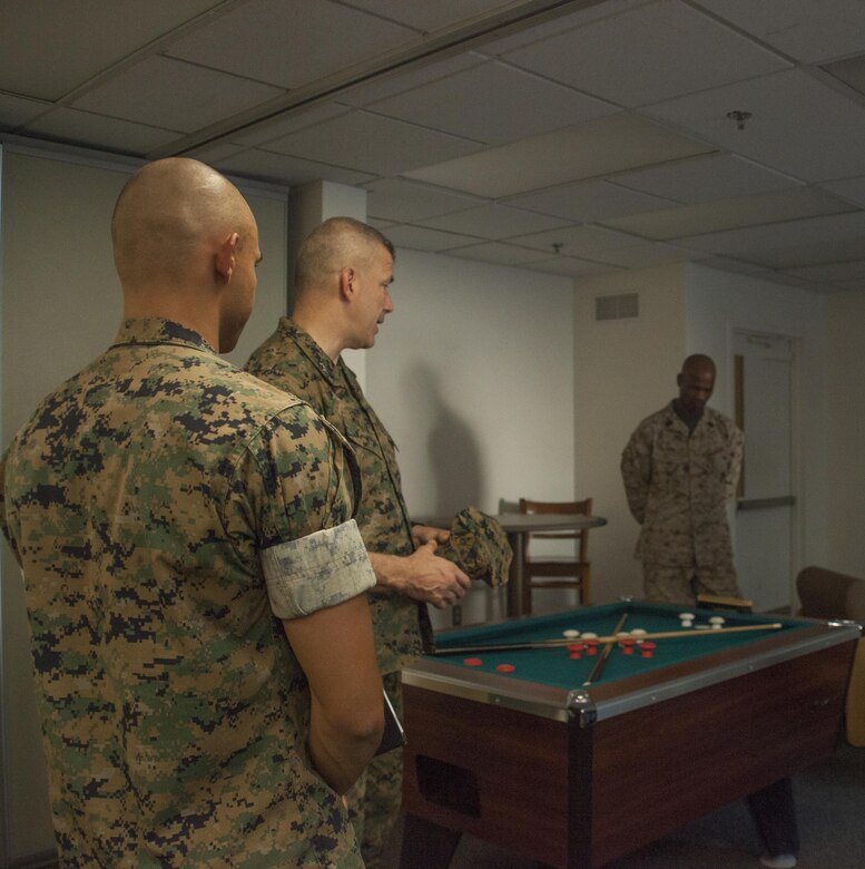 Maj. Gen. William F. Mullen III, commanding general, Marine Corps Air Ground Combat Center, Twentynine Palms, Calif., inspects one of the lounges renovated at barracks 1404 aboard the Combat Center, Oct. 5, 2017. Marines with 7th Marine Regiment and Public Works Division personnel renovated rooms and lounges for the purpose of providing improved living quarters for the deployed Marines of the regiment.  (U.S. Marine Corps photo by Cpl. Natalia Cuevas)