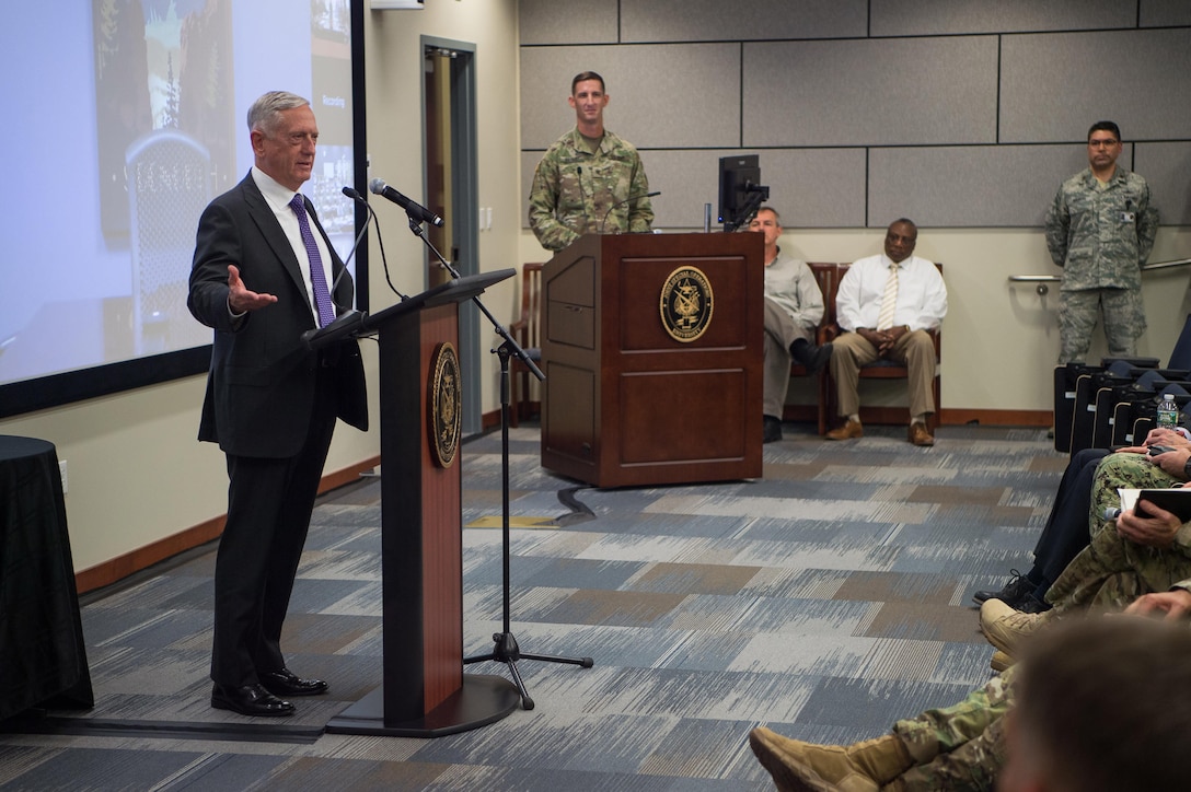 Defense Secretary Jim Mattis speaks at a lectern.