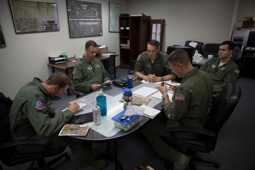 The C-130H Hercules crew from the 36th Airlift Squadron conducts their last mission briefing at Yokota Air Base, Japan, Oct. 5, 2017. This is the last active duty C-130H Hercules tactical training sortie.