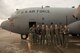 Crew members from the 36th Airlift Squadron pose for a photo in front of a C-130H Hercules, tail #74-2065 at Yokota Air Base, Japan, Oct. 5, 2017. This is the last active duty C-130H Hercules tactical training sortie.