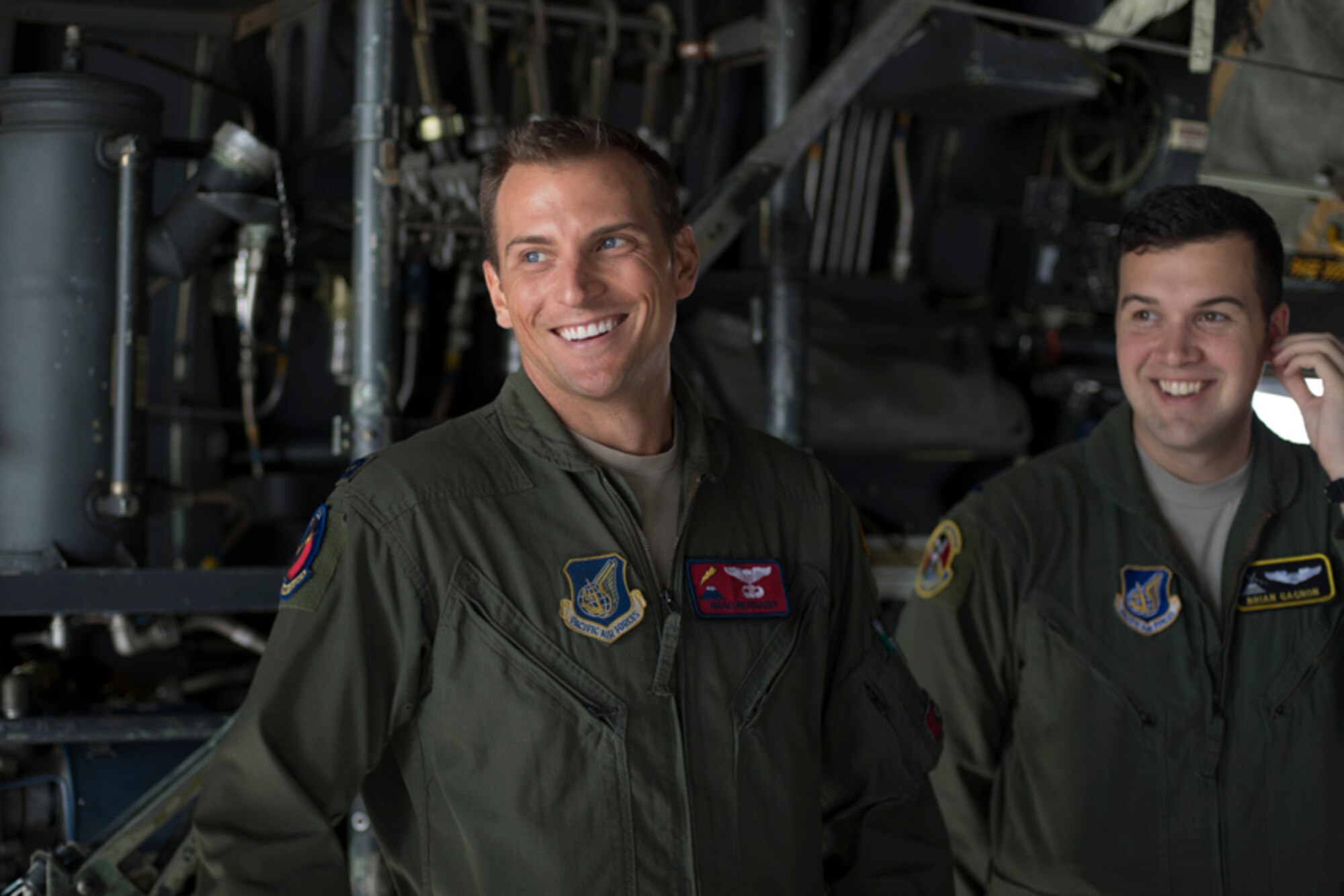 Capt. Thomas Bernard, 36th Airlift Squadron C-130H pilot, and 1st Lt. Brian Gagnon, 36th AS C-130H navigator, listen to a crew briefing on a C-130H Hercules at Yokota Air Base, Japan, Oct. 5, 2017. This is the last active duty C-130H Hercules tactical training sortie.