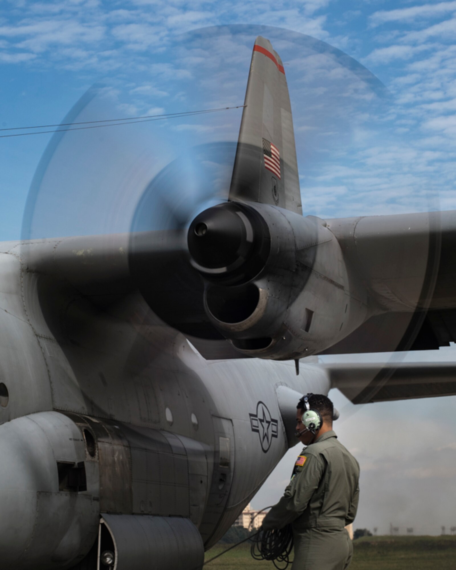 Senior Airman Gary Coe, 36th Airlift Squadron C-130H loadmaster, completes a pre-flight inspection of a C-130H Hercules at Yokota Air Base, Japan, Oct. 5, 2017. This is the last active duty C-130H Hercules tactical training sortie.