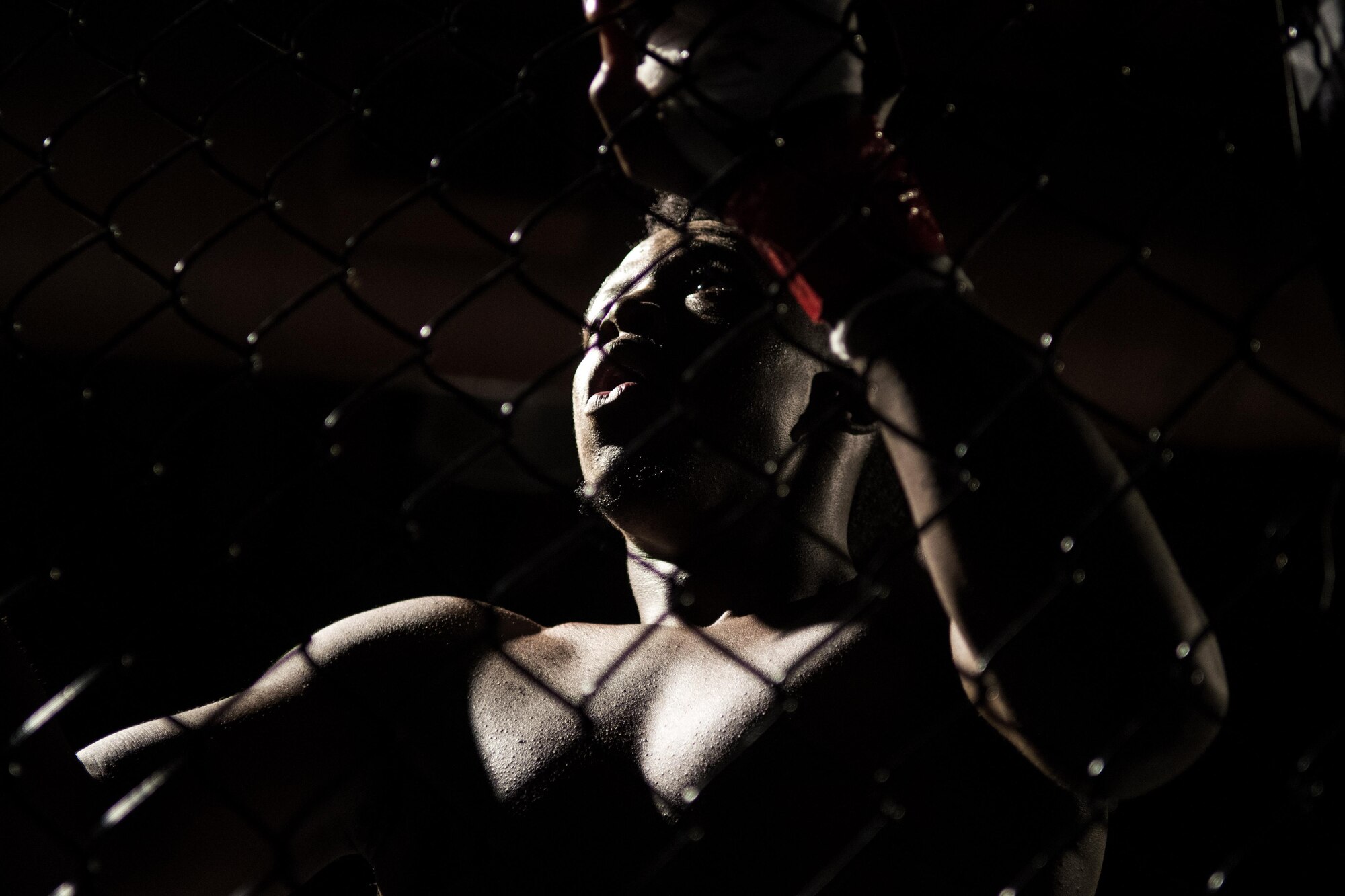 Trey Singleton, Marshalls Mixed Martial Arts and Jiujitsu instructor and second degree black belt, prepares for a cage fight.