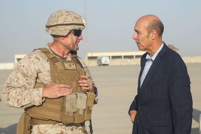 U.S. Marine Brig. Gen. Roger Turner, left, the commanding general of Task Force Southwest, speaks with Ambassador Hugo Llorens, right, the Special Chargé d’Affaires of the U.S. Embassy in Kabul, at Bastion Airfield, Afghanistan, Oct. 12, 2017. Llorens had an opportunity to meet with Marines from the Task Force and discuss the importance of their train, advise and assist mission in Helmand province. (U.S. Marine Corps photo by Sgt. Lucas Hopkins)