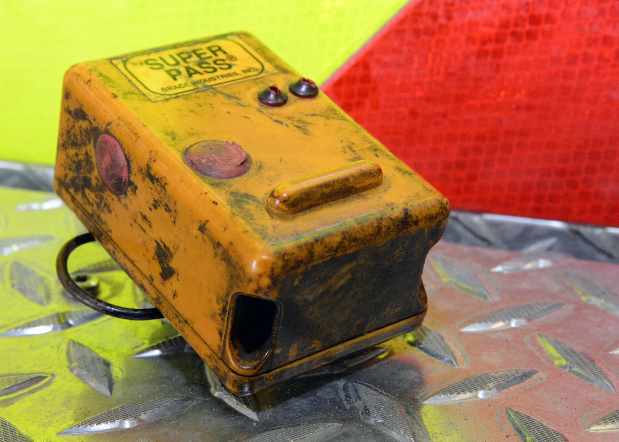 This burnt-out personal alert safety system was the only piece of gear, belonging to then-Airman 1st Class William Taylor, which survived when he was trapped and alone in a training fire in July 1997 near Maxwell Air Force Base, Ala. Now-Chief Master Sgt. Taylor said the damaged PASS is sentimental and serves as a reminder of how dangerous a firefighter’s job is, and that they have the potential to be called upon to make the ultimate sacrifice in service of fellow patriots. (U.S. Air Force photo by Karen Abeyasekere)