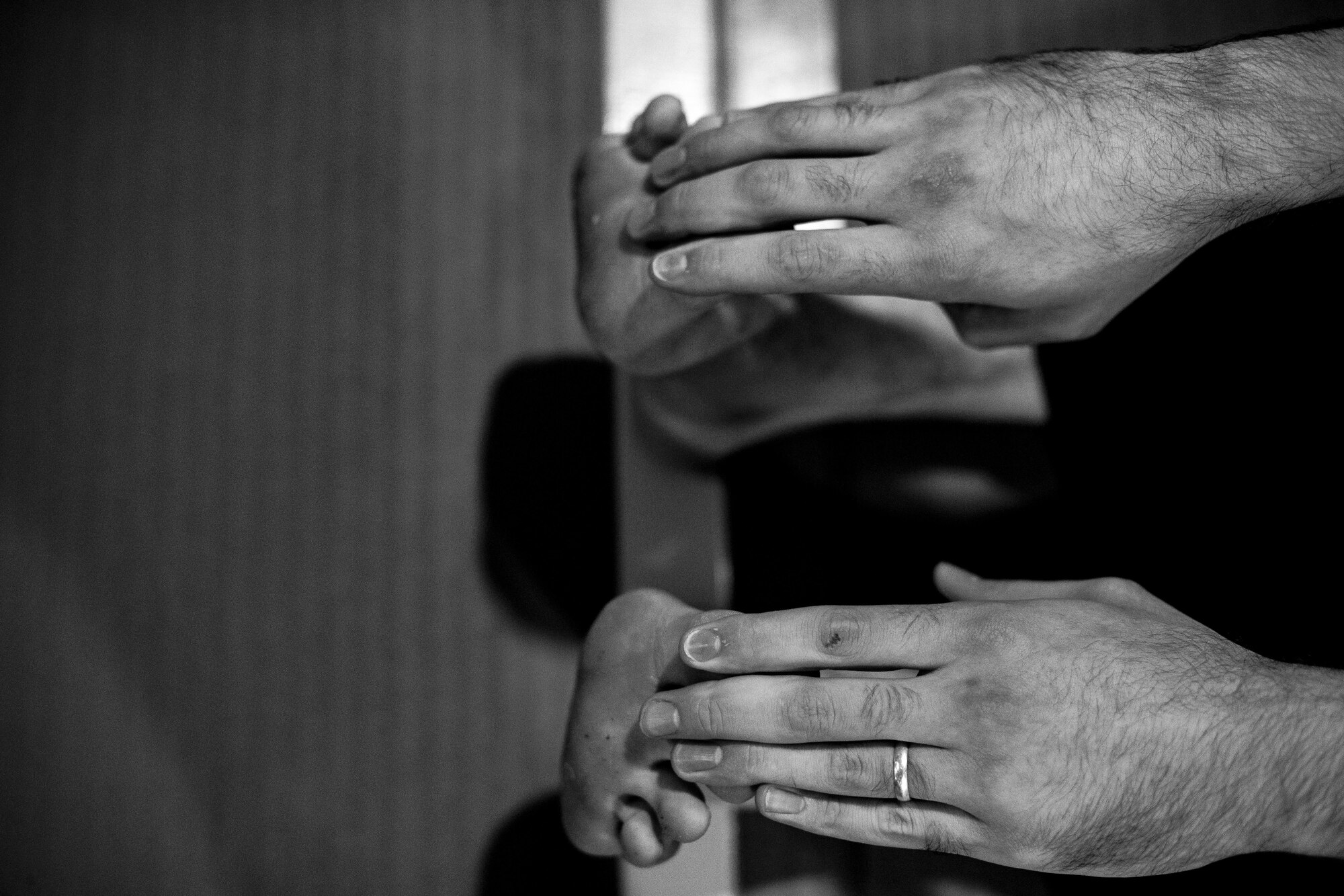 U.S. Air Force Staff Sgt. Brandon Sabin, 86th Airlift Wing Public Affairs broadcast journalist, performs stretches before a mixed martial arts class at the Vogelweh Community Center on Vogelweh Military Complex, Germany, Oct. 11, 2017. Karate requires flexibility to perform some of the techniques and forms. Stretching before a session prevents injury and allows the martial artists to perform them. (U.S. Air Force photo by Senior Airman Devin Boyer)