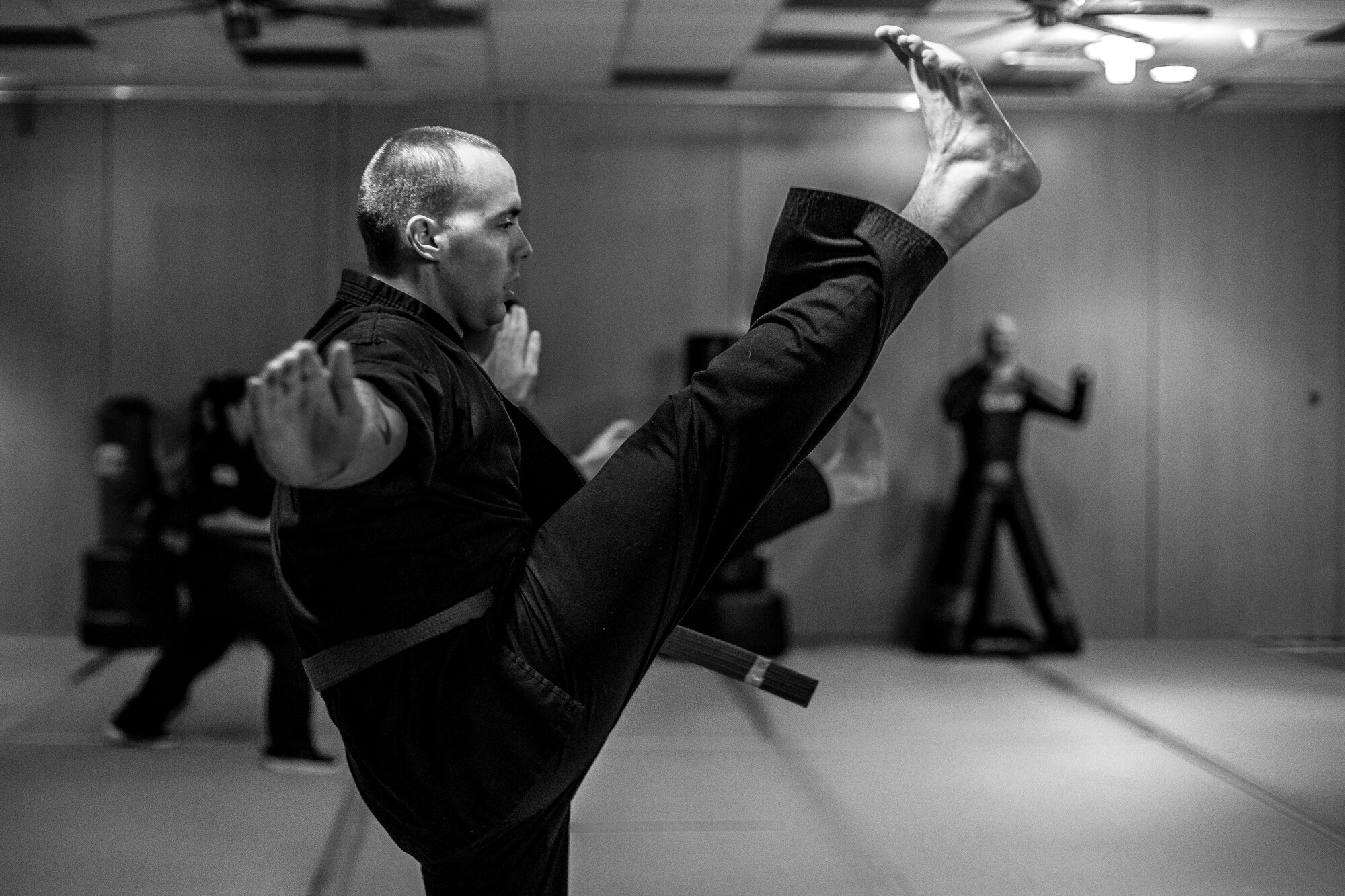 U.S. Air Force Staff Sgt. Brandon Sabin, 86th Airlift Wing Public Affairs broadcast journalist, practices forms during a mixed martial arts class at the Vogelweh Community Center on Vogelweh Military Complex, Germany, Oct. 11, 2017. Sabin uses martial arts as a physical fitness outlet. He said martial arts is an exercise he genuinely enjoys because it keeps his mind engaged. (U.S. Air Force photo by Senior Airman Devin Boyer)
