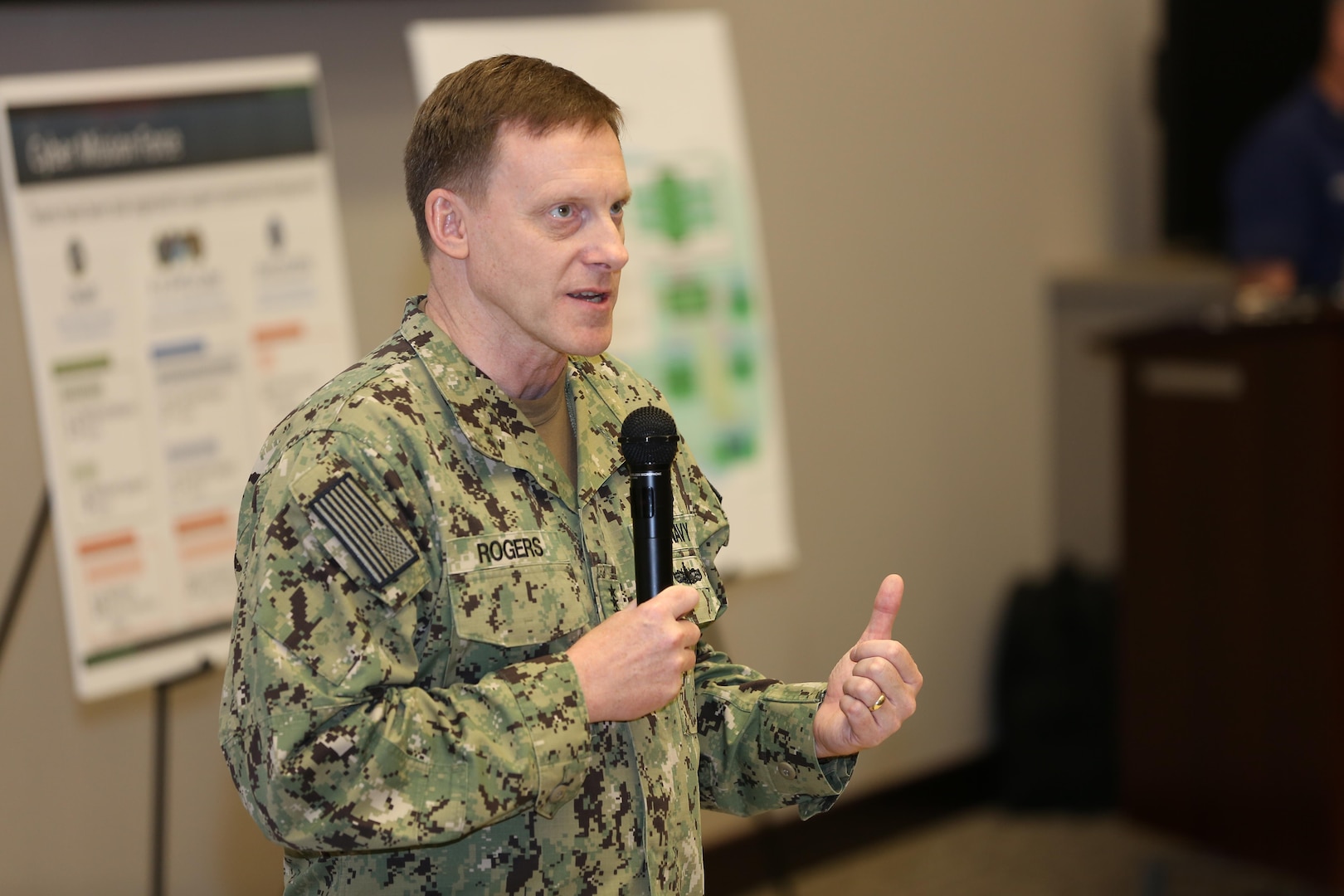 Navy Adm. Michael S. Rogers, Commander, USCYBERCOM, gives remarks at the 2017 Cyber Guard exercise June 12, 2017. Cyber Guard is a weeklong exercise conducted in June to test and exercise the men and women of U.S. Cyber Command's Cyber Mission Force and interagency partner teams from across federal and state organizations tasked with defending critical infrastructure. During his opening remarks, Rogers set the tone regarding the challenge of the exercise. "What I constantly tell the team leads is it's about pushing the envelope. It's about challenging your teams, and it's about trying different things."