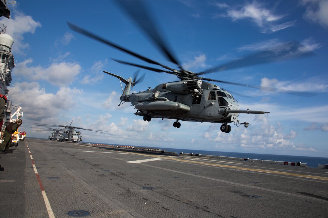 U.S. Marines with Marine Medium Tiltrotor Squadron (VMM) 162 (Reinforced), 26th Marine Expeditionary Unit (MEU),  disembark the amphibious assault ship USS Kearsarge (LHD 3) via CH-53E Super Stallion helicopter also with VMM 162 (REIN), in the Caribbean Sea, Oct. 12, 2017.