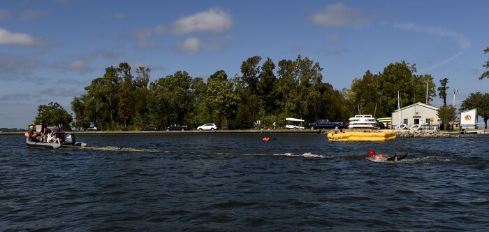 A student participating in Survival, Evasion, Resistance and Escape Block Training is pulled behind a boat while attempting to remove their parachute Oct. 2, 2017.