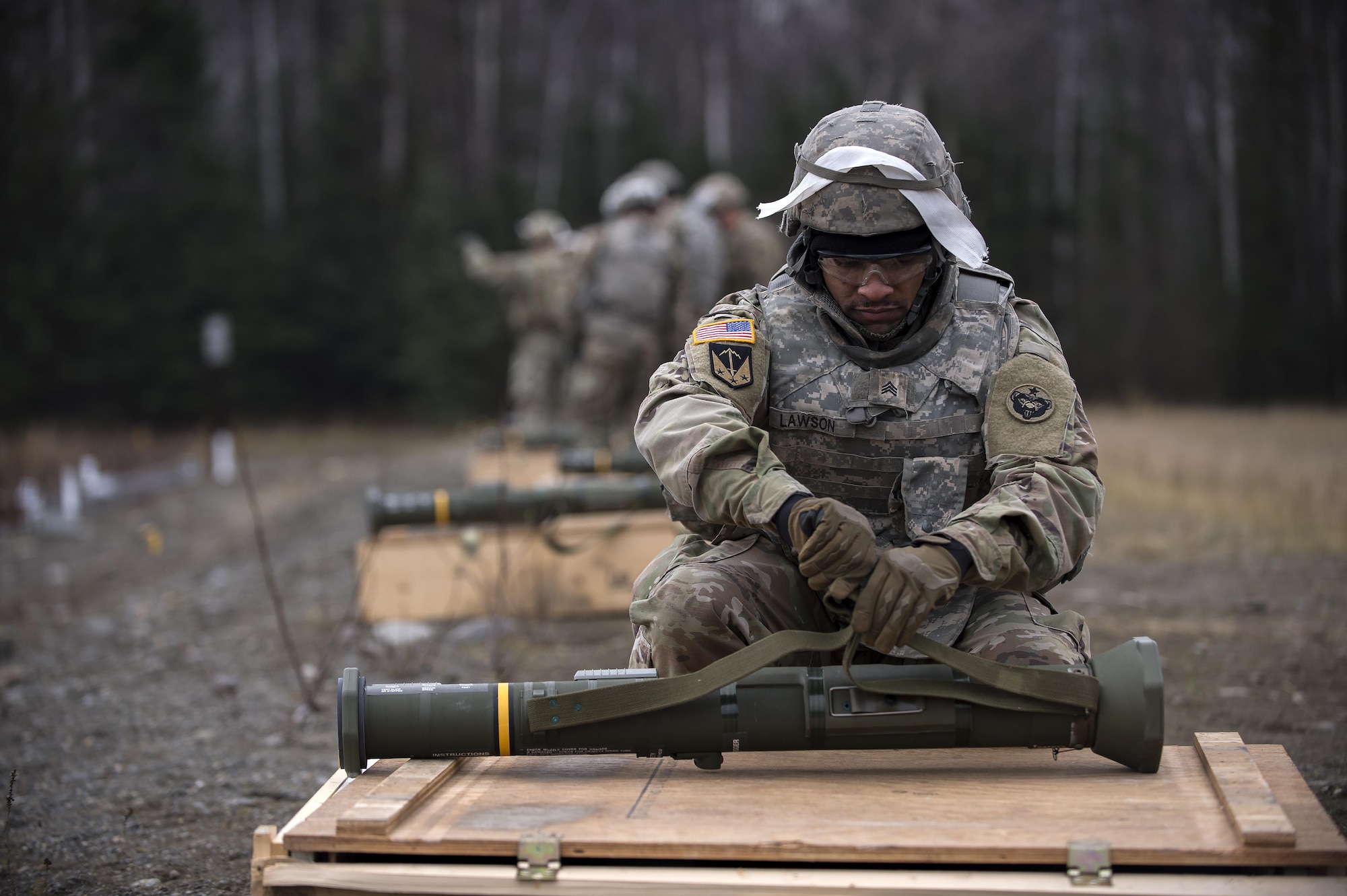 Army Sgt. Derek Lawson, assigned to the 109th Transportation Company, 17th Combat Sustainment Support Battalion, U.S. Army Alaska, prepares a M136E1 AT4-CS confined space light anti-armor weapon for firing at Joint Base Elmendorf-Richardson, Alaska, Oct. 12, 2017. The Soldiers of 17th CSSB recently completed a series of live-fire training events that honed their skills on a variety of weapon systems to include: the M4 carbine, the M9 pistol, the M203 grenade launcher, and the M136E1 AT4-CS confined space light anti-armor weapon.